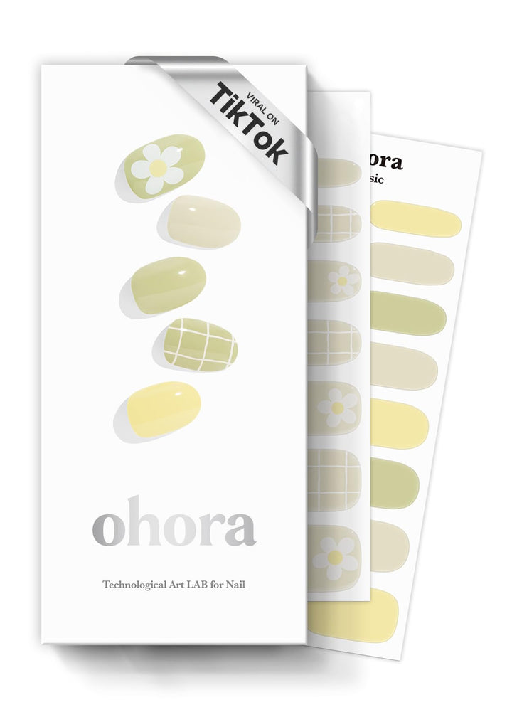 ohora front packaging showing green patterned strips and included tools for quick application