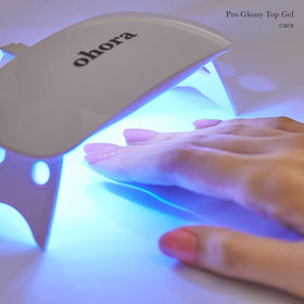 ohora hand next to coin showing size and fit of ohora gel wraps