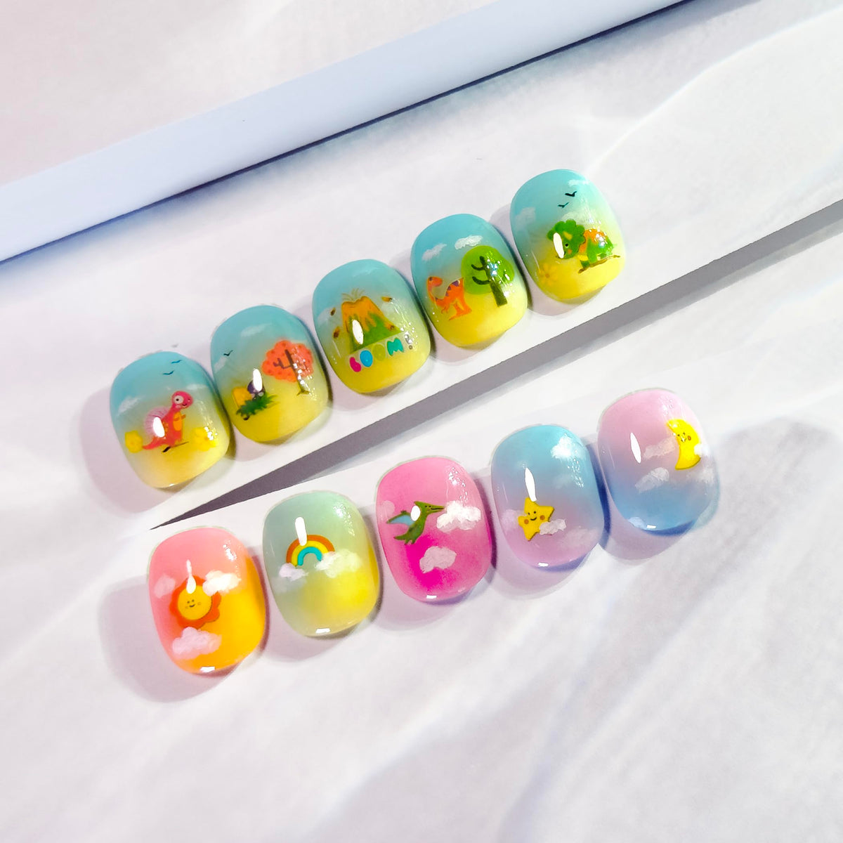 okiyomi assorted sticker sizes side-by-side for matching toddlers to adult nails