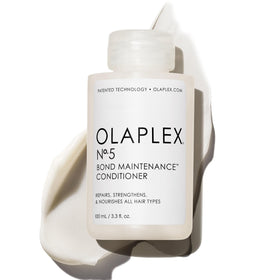 Olaplex front packaging showing 100 mL bottle and repairing benefits