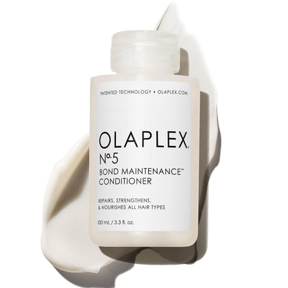 Olaplex front packaging showing 100 mL bottle and repairing benefits
