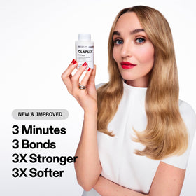 Close-up of Olaplex N°.3PLUS label with ingredient focus and trust benefit