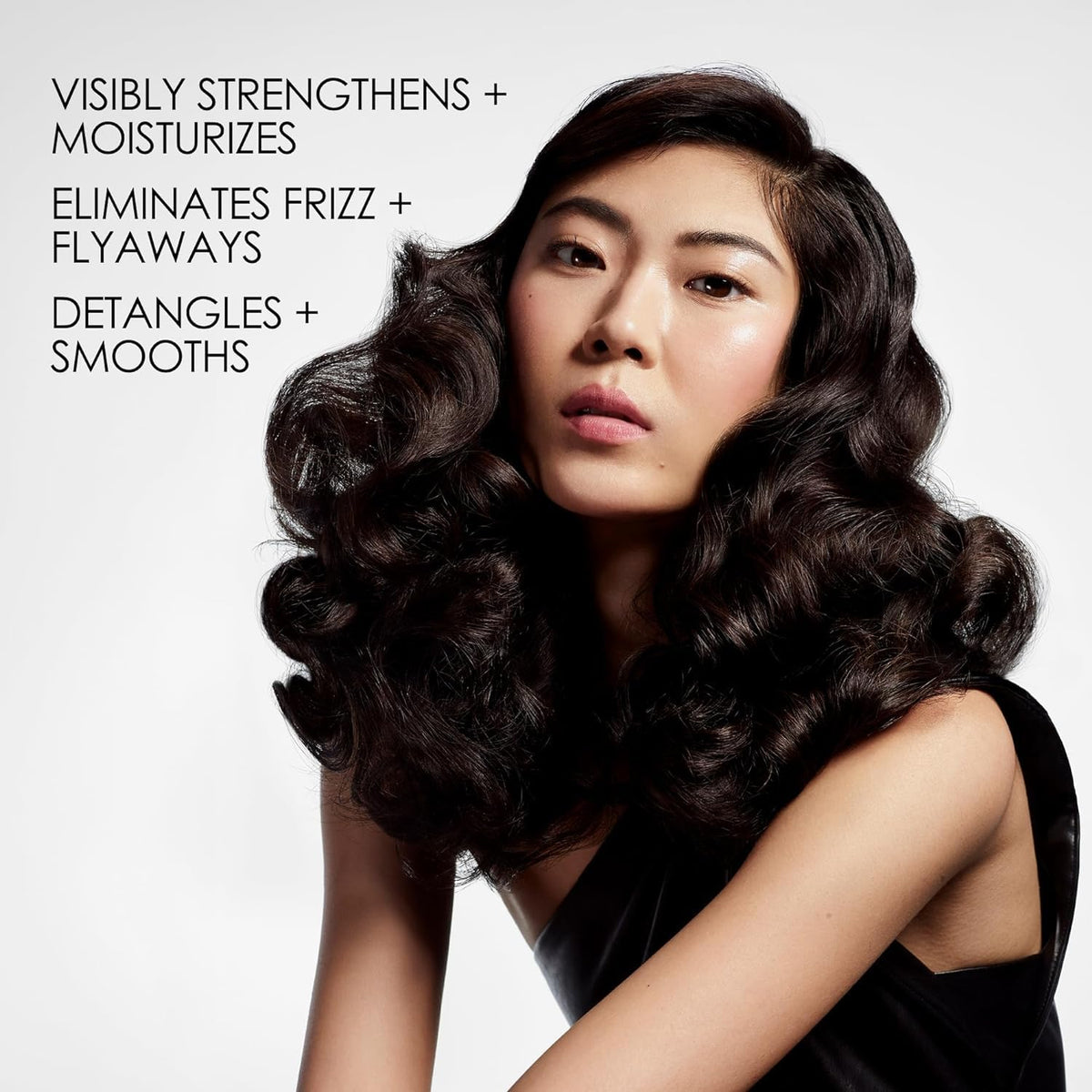 Olaplex Nº.5 conditioner texture on hand demonstrating concentrated consistency