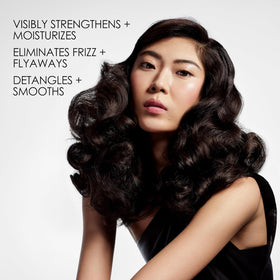 Olaplex Nº.5 conditioner texture on hand demonstrating concentrated consistency