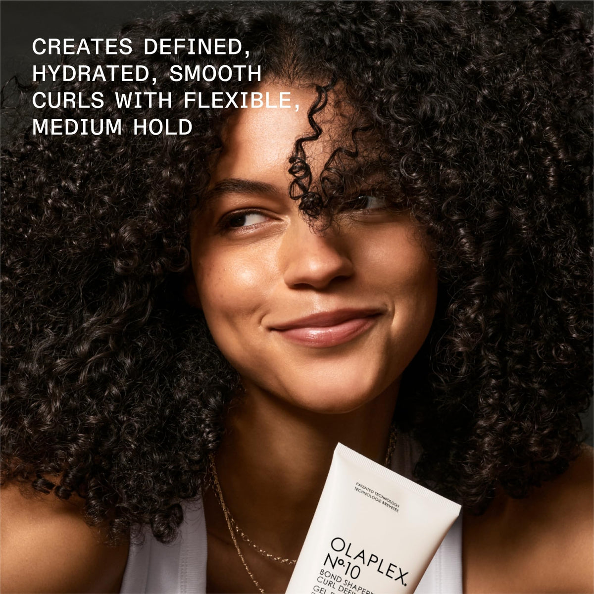 Olaplex Nº.10 gel being dispensed from pump for easy application benefit