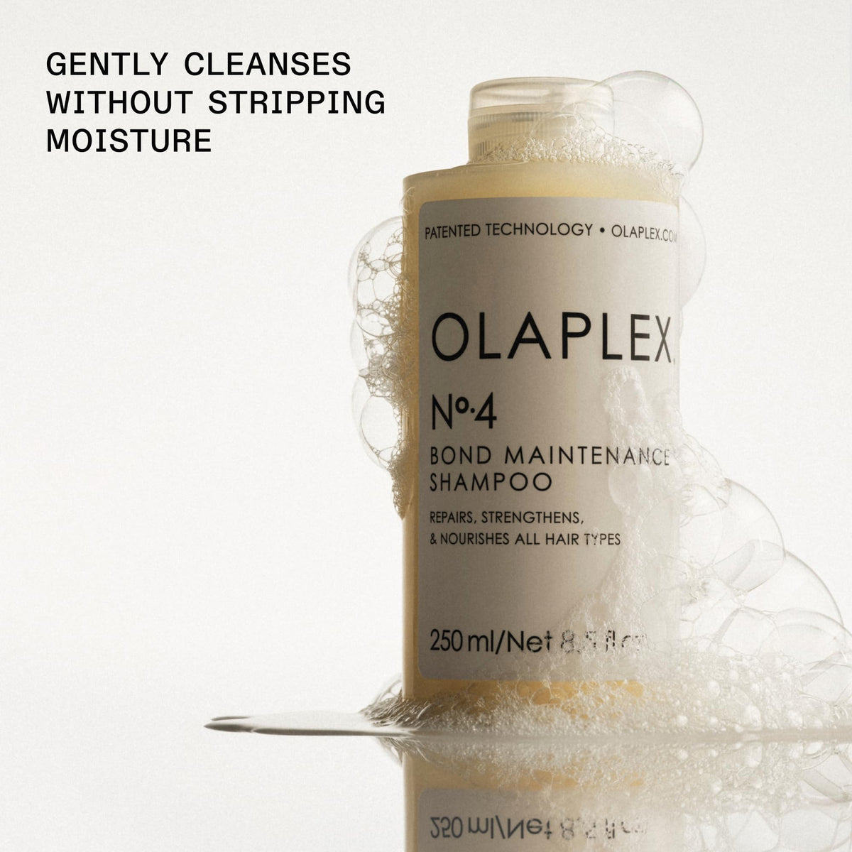 Olaplex 1000ml bottle next to standard bottle showing value size benefit