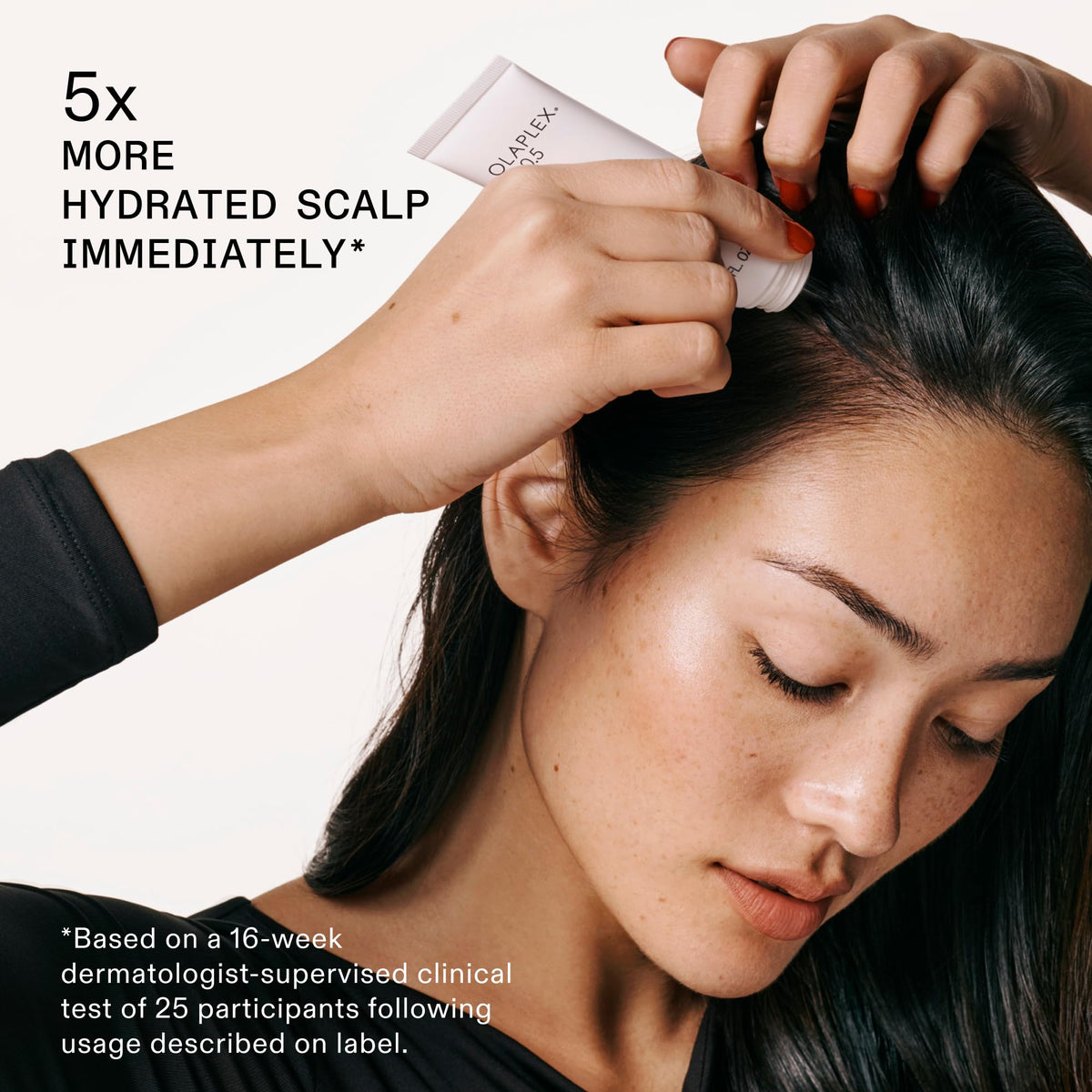 Olaplex No.5FINE conditioner spread in hand, detangles and adds weightless moisture