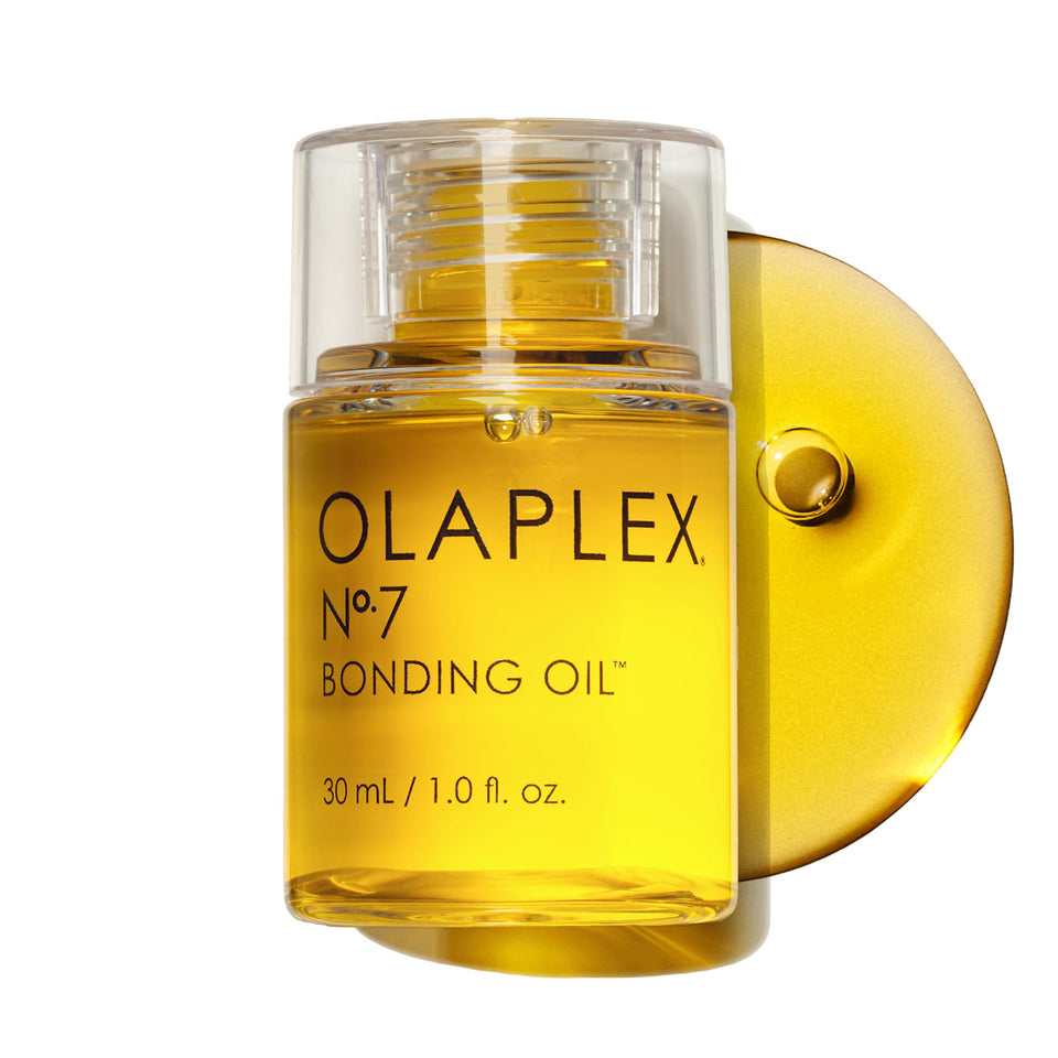 Olaplex No.7 front bottle showing label and compact 1 fl oz size for easy travel