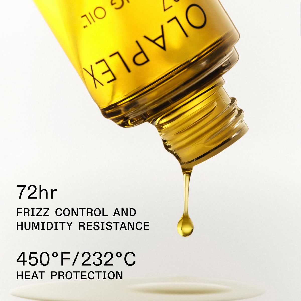 close-up of Olaplex No.7 oil texture on fingers showing lightweight shine and slip