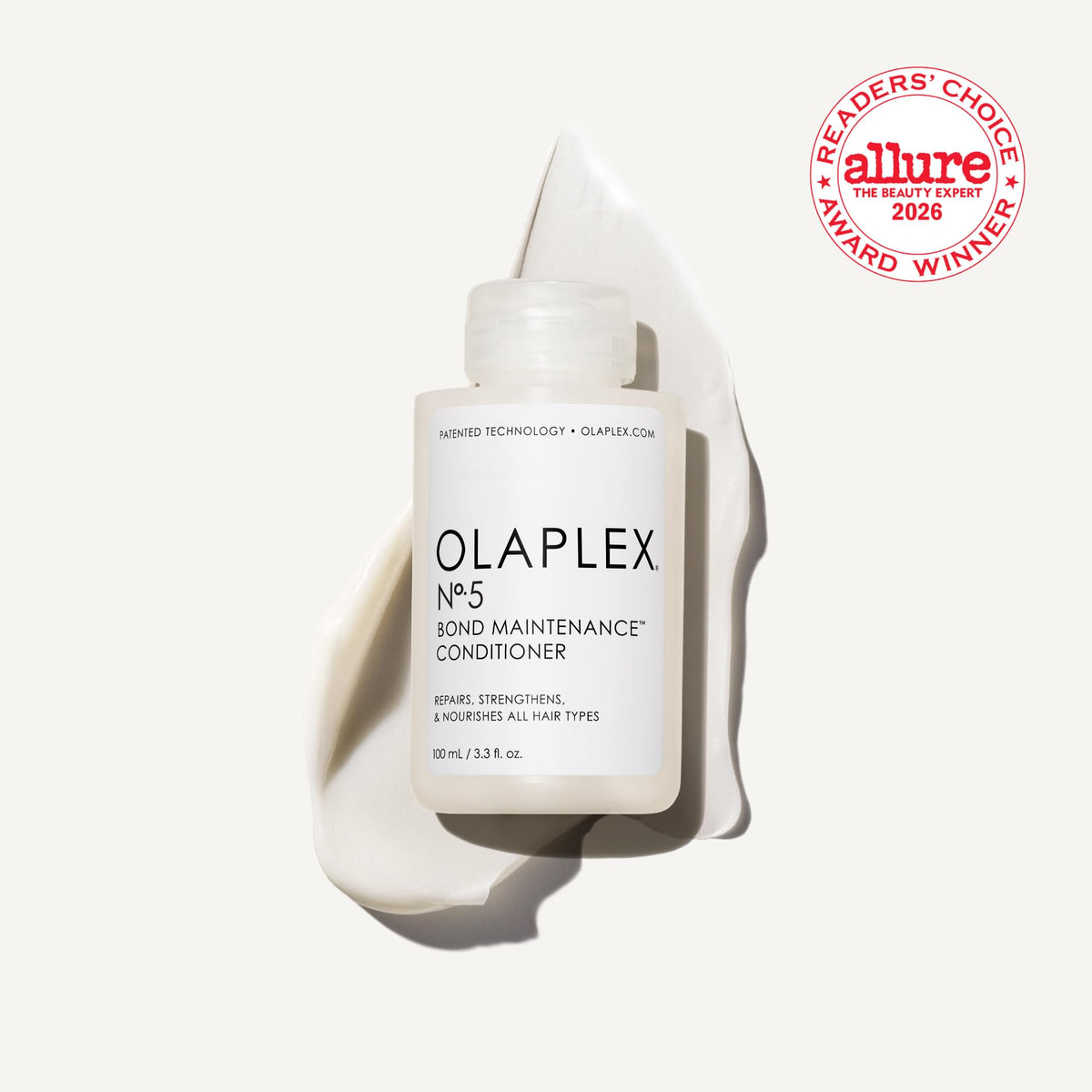 Olaplex pump top detail for controlled, mess‑free dispensing benefit