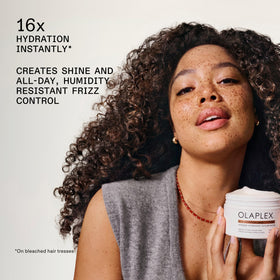 Olaplex open jar texture showing creamy mask and hydrating consistency benefit: moisture-rich feel