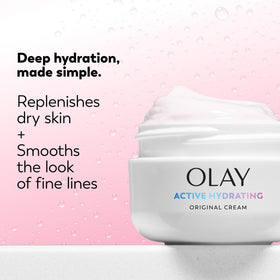Olay cream spread on hand illustrating quick absorption benefit