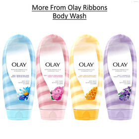 Olay bottle held in hand to show 18 fl oz scale and travel convenience