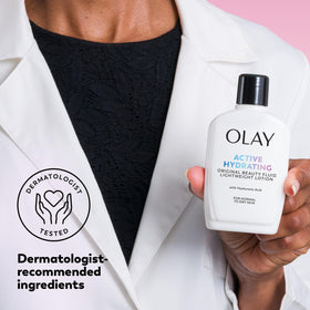 Olay bottle beside a makeup bag illustrating daily routine compatibility
