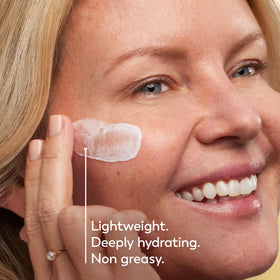Olay moisturizer spread on forehead showing hydration and smoothing