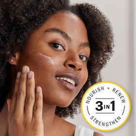 Olay Complete label close-up highlighting active ingredients and clean formulation benefit