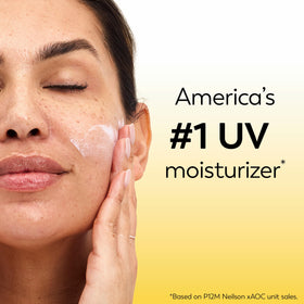 Olay on bathroom counter illustrating daily skincare routine benefit