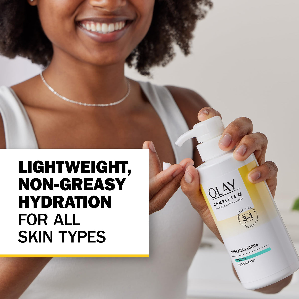 Olay Complete dispensing lotion texture on hand, demonstrating quick absorption benefit
