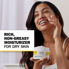 Olay ingredient display highlighting niacinamide vitamin E and ceramides benefit