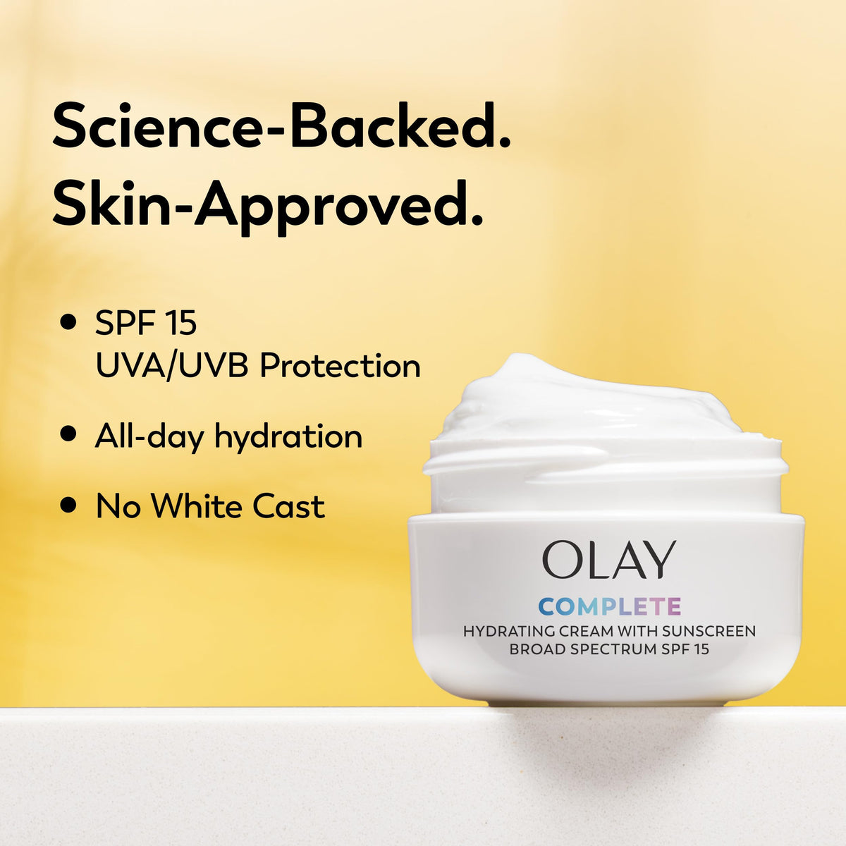 Olay moisturizer applied on hand demonstrating even coverage and hydration