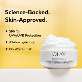 Olay moisturizer applied on hand demonstrating even coverage and hydration