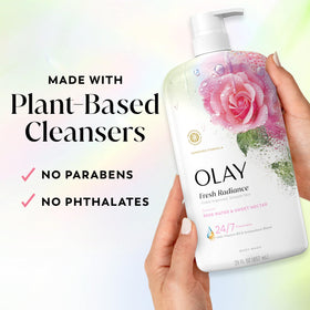 Olay Fresh Radiance bottle held in hand to show 29 fl oz scale