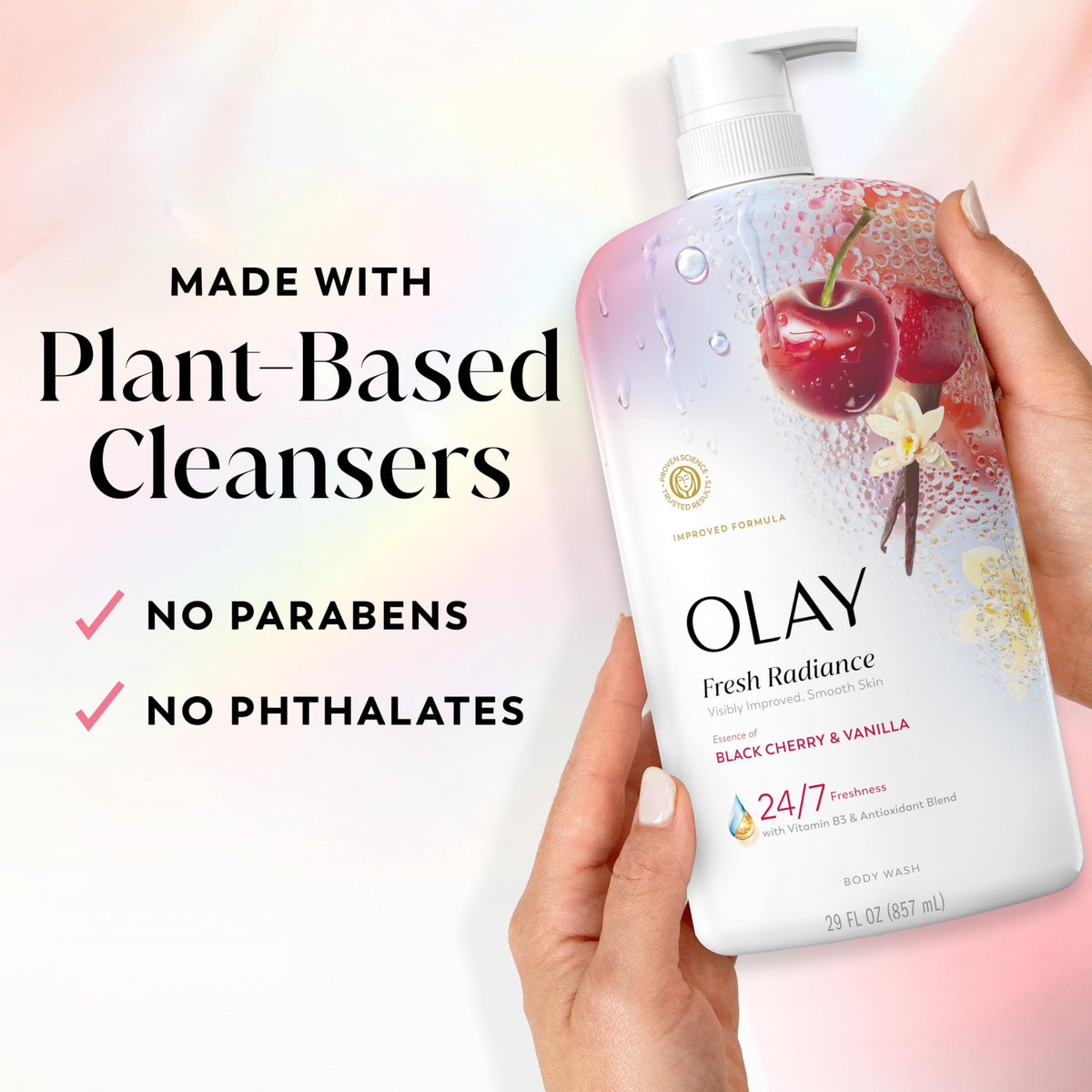 Black cherry and vanilla visual with Olay bottle evoking fresh, comforting scent benefit
