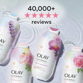 Peach and cherry blossom still life next to Olay Fresh Radiance bottle evoking scent