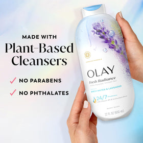 Olay Fresh Radiance 22 fl oz bottle in hand showing true size