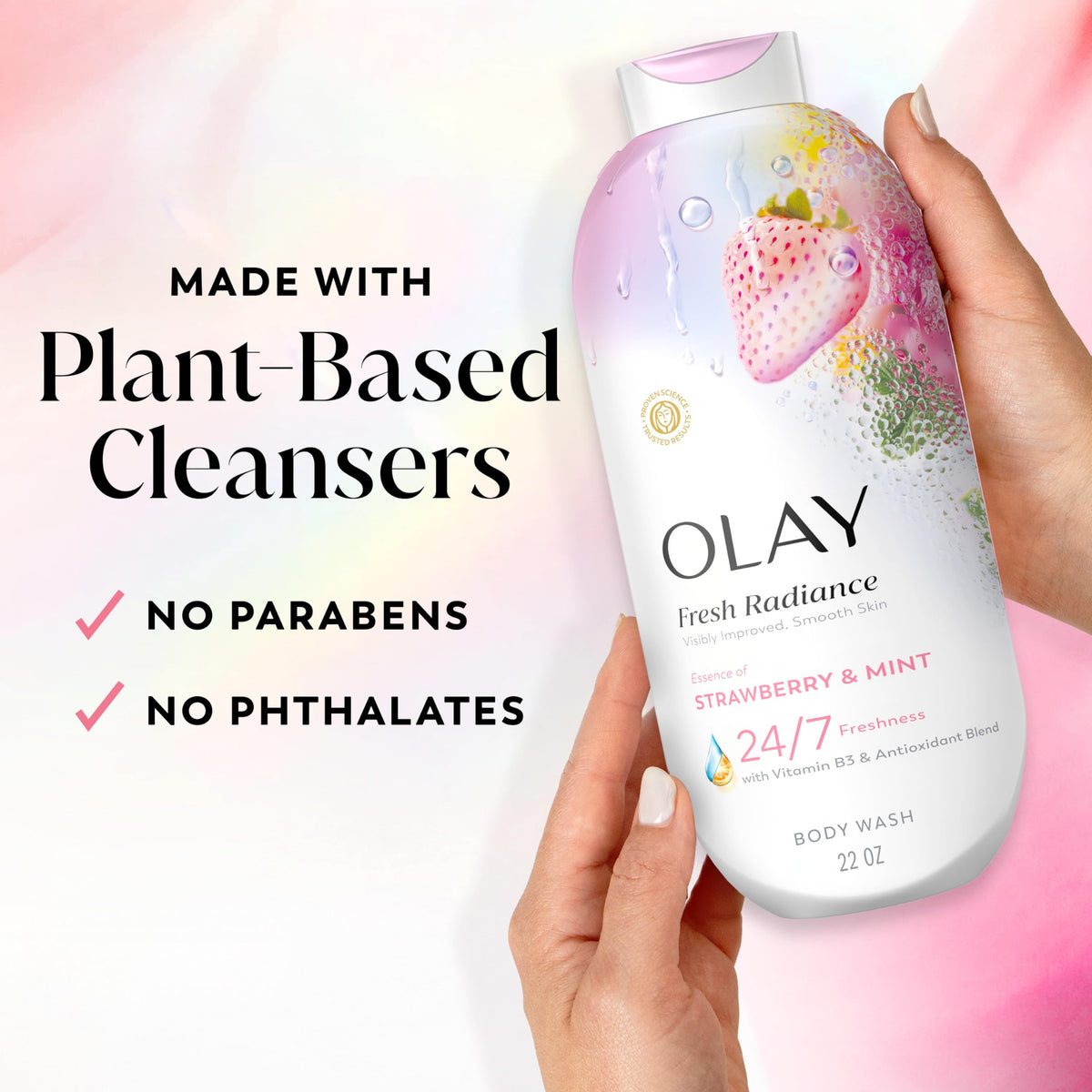 Olay 22 fl oz bottle beside a hand for size and scale reassurance
