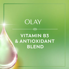 Olay bottle with water splash in studio conveying refreshing citrus shower experience