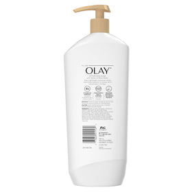 Olay lotion poured with rose water and petals illustrating delicate fresh scent