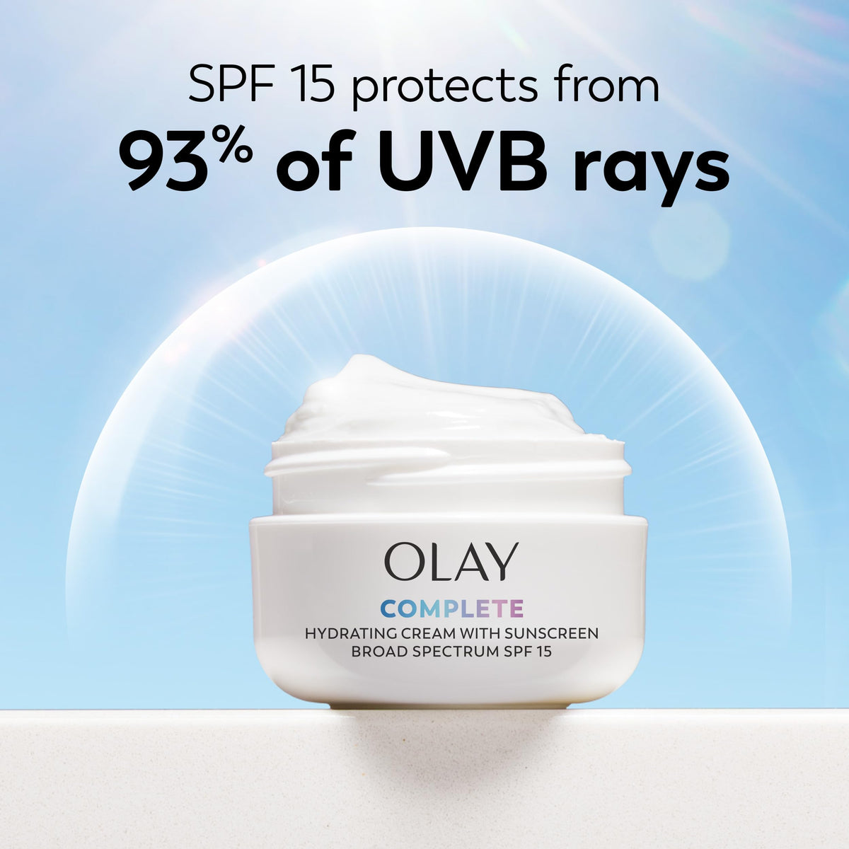 Olay lotion blended under makeup showing non-greasy base for cosmetics