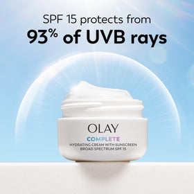 Olay lotion blended under makeup showing non-greasy base for cosmetics