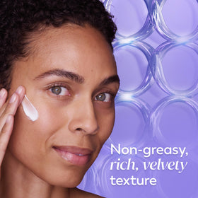 Olay cream applied to hand during night routine showing easy absorption