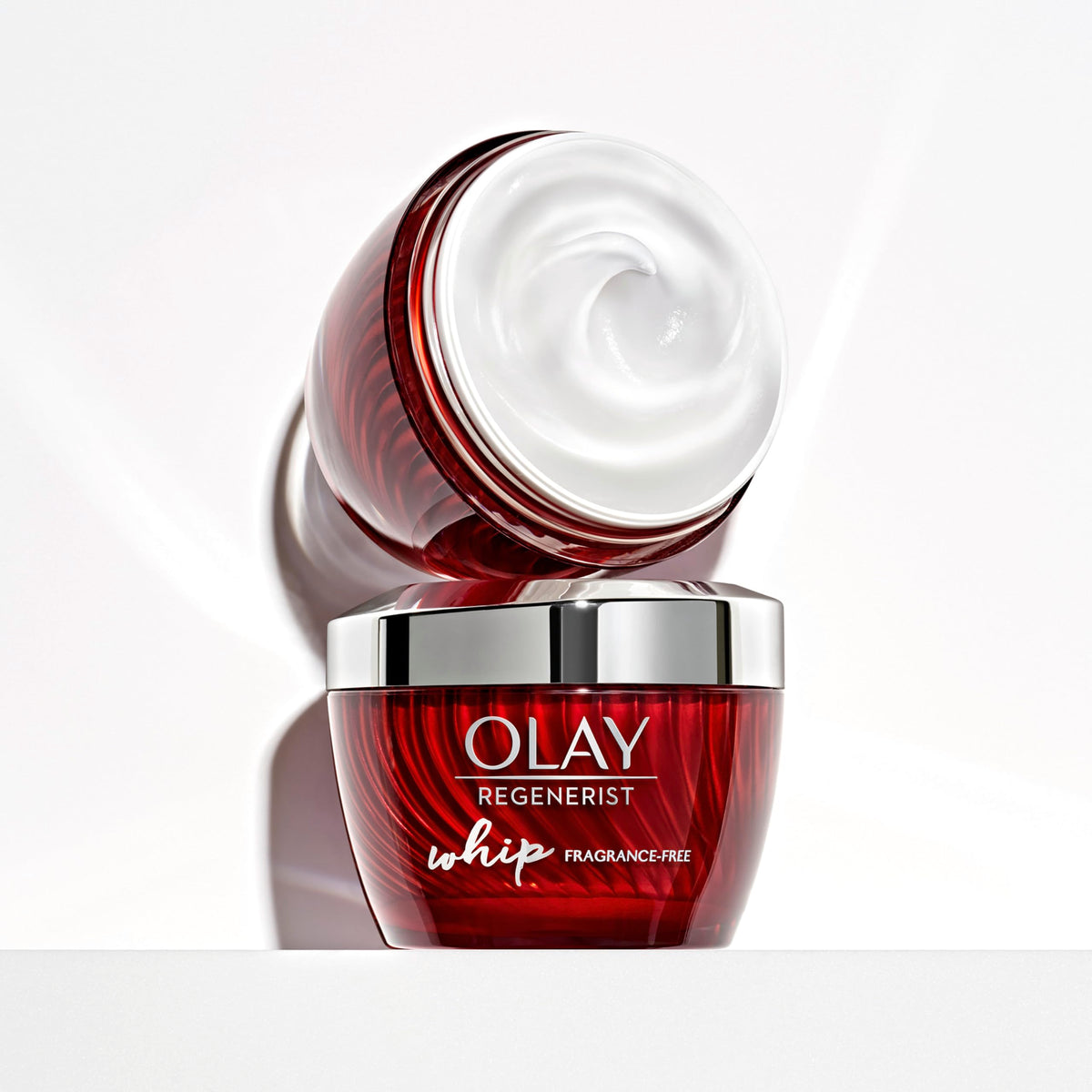 Olay Regenerist Whip placed on a bathroom vanity showing everyday lifestyle convenience