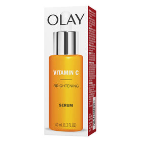 Olay serum on bathroom counter in evening routine setting for nightly use