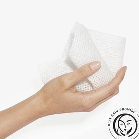 Olay size comparison in hand showing single cloth scale and portability