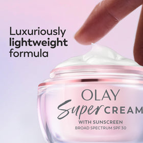 Olay product label close-up highlighting niacinamide and vitamin C ingredients