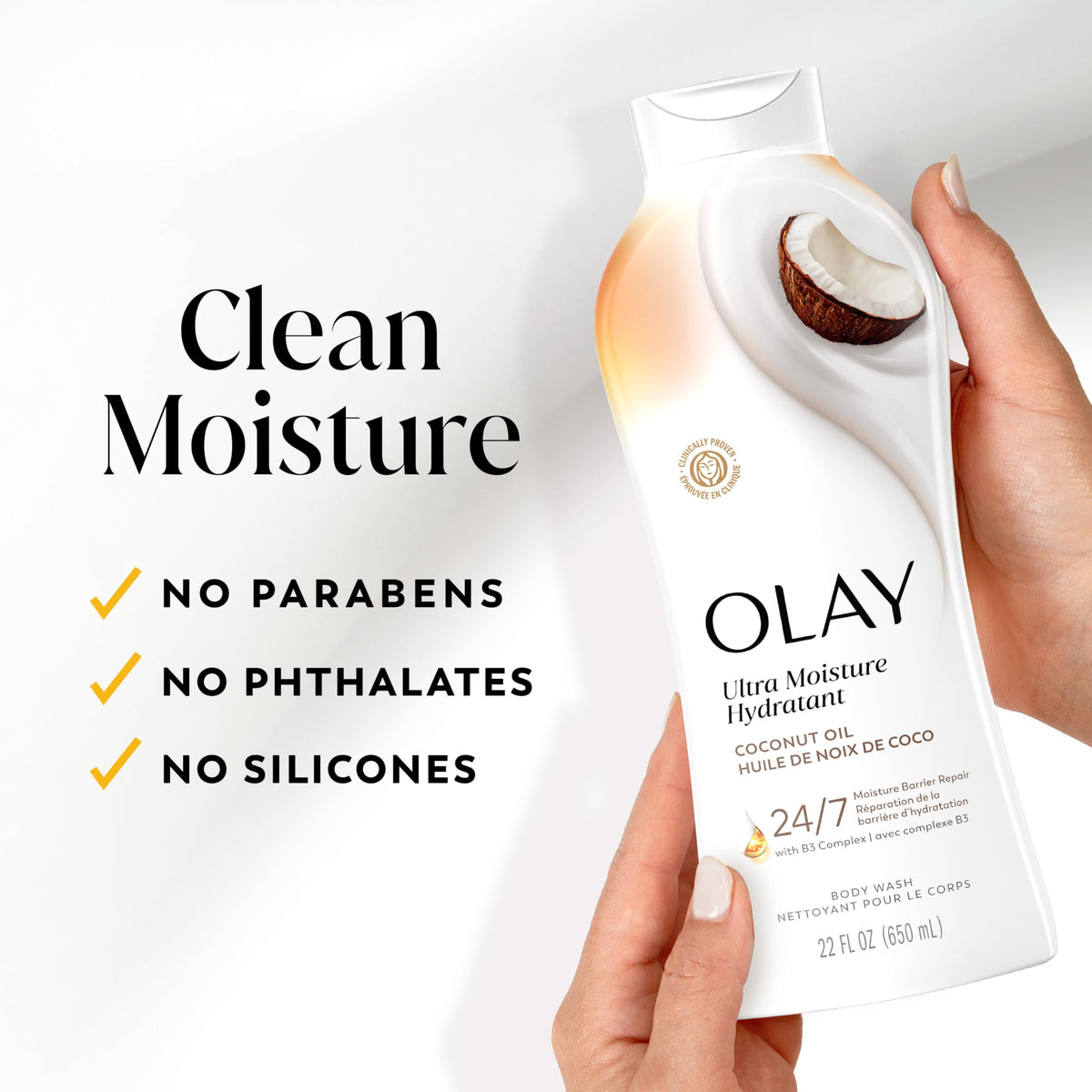 Close-up of coconut imagery next to Olay bottle suggesting pleasant scent