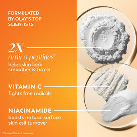 hand applying Olay moisturizer to show easy spreadability and glow