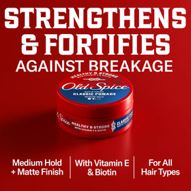 Old Spice pomade on hand being warmed for even application benefit