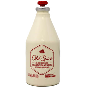 Old Spice bottle next to ruler showing 4.25 oz size and travel ease