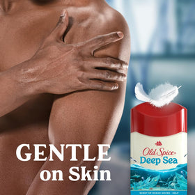 Old Spice size comparison with hand to show 2.6 oz travel-friendly benefit