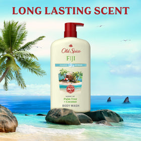 Old Spice Fiji bottle beside palm leaf and coconut suggesting tropical fragrance