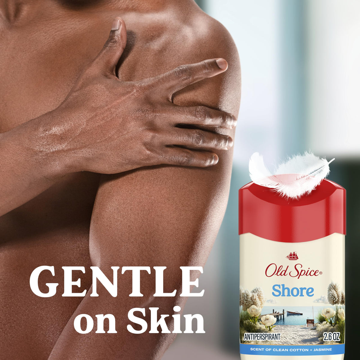 Old Spice in hand to show 2.6 oz scale and travel-friendly benefit