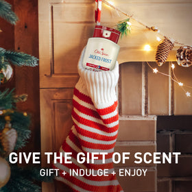 Old Spice Jacked Frost bottle in hand to show scale and comfortable grip