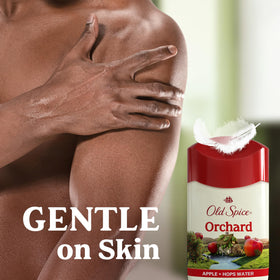 Old Spice Orchard size comparison with hand to show 2.6 oz portability