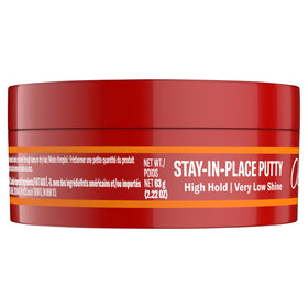 Old Spice putty packed in a travel pouch for on-the-go styling