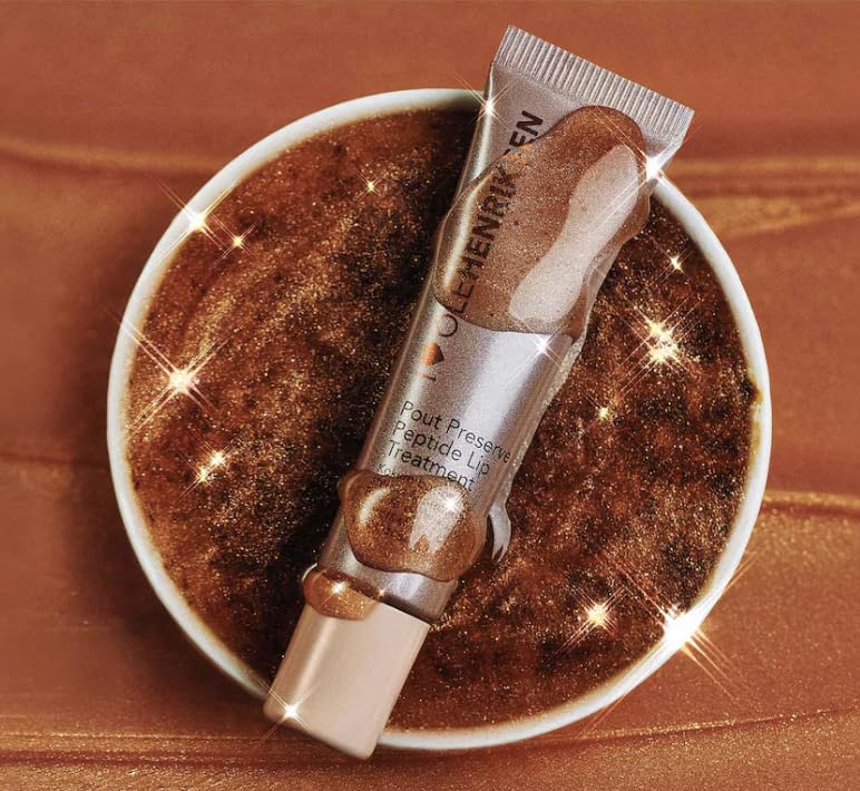 Ole Henriksen applied on lips in lifestyle setting adding subtle shimmer and polish